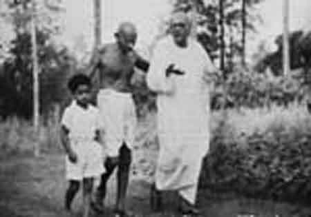 Gandhiji with Sarat Chandra Bose and a small boy at the Sodepur Khadi Pratishthan in August, 1947.jpg